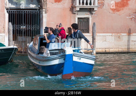 Filmcrew cameraman sound engineer producer working in Venice, Italy Stock Photo