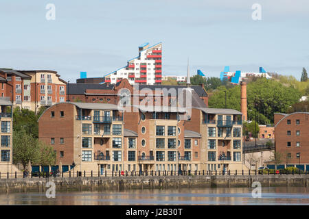 Apartments on Newcastle quayside with Byker wall in the background, England, UK Stock Photo