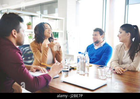 Group of business people discussing at work Stock Photo