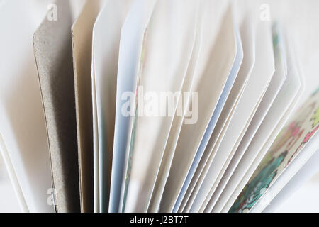 Notebooks, planners and photo albums in scrapbooking style with colorful pages Stock Photo