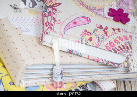 Notebooks, planners and photo albums in scrapbooking style with colorful pages Stock Photo