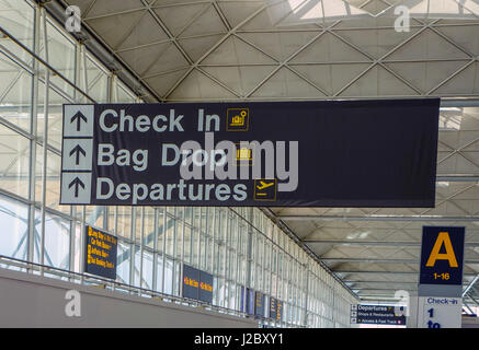 Check In, Bag Drop, Departures sign, London Stansted Airport Stock Photo