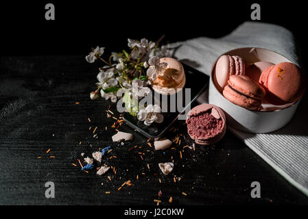 Morning with macaron on the black background Stock Photo