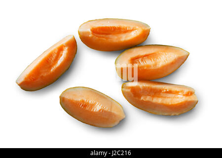 Close-up of some slices of cantaloupe on a white background Stock Photo