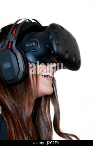Woman Tries Virtual Reality HTC Vive Headset Stock Photo