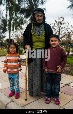 Old Kurdish woman with tattoos in her face in the Martyr Sami Abdul-Rahman Park in Erbil or Hawler, capital of Iraq, Kurdistan (Large format sizes available) Stock Photo