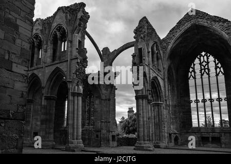 East window and choir, Melrose Abbey, Scottish Borders: black and white version Stock Photo