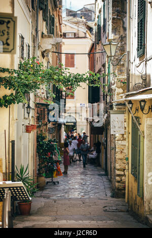 Corfu, Greece - August 18, 2015: Beautiful old city street, added retro filter, on Corfu, Kerkyra, Greece. Stock Photo