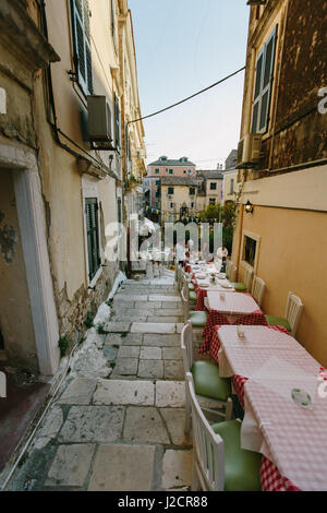 Corfu, Greece - August 18, 2015: Beautiful old city street, added retro filter, on Corfu, Kerkyra, Greece. Stock Photo