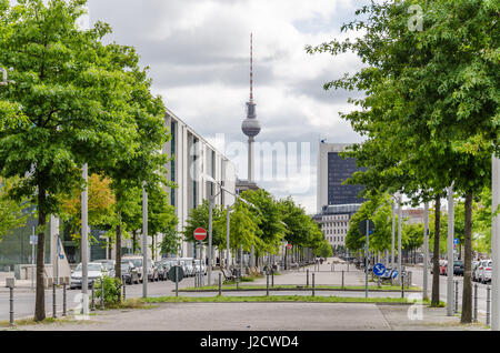 Berlin, Germany - August 14, 2016: Paul Loebe Alley with Paul Loebe House to the left, 25 stores international trading center and television tower Stock Photo