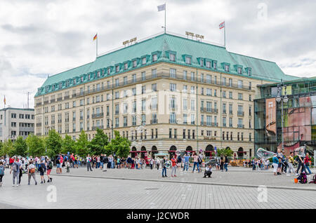 Berlin, Germany - August 14, 2016: View of Pariser Platz, a square in the centre of Berlin, with Hotel Adlon Kempinski, people enjoying a summer day a Stock Photo
