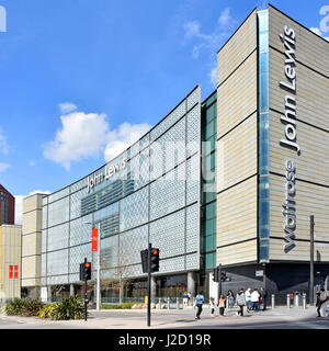John Lewis department store building with Waitrose sign which is in an adjacent location both within the UK Stratford City Westfield Shopping Centre Stock Photo