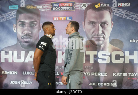 London, UK. 27th April 2017. Anthony Joshua and Wladimir Klitschko pose during the press conference. Anthony Joshua and Wladamir Klitschko are due to fight for the IBF, IBO and WBA Super Heavyweight Championships of the World at Wembley Stadium on Saturday, the 29th of April 2017. Credit: Michael Tubi/Alamy Live News Stock Photo