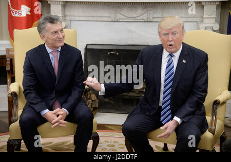 Washington, USA. 27th Apr, 2017. US President Donald Trump meets with President Mauricio Macri of Argentina in the Oval Office of the White House in Washington, DC, on April 27, 2017. Credit: MediaPunch Inc/Alamy Live News Stock Photo