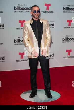 Coral Gables, Florida, USA. 27th April, 2017.  Yandel attends the Billboard Latin Music Awards at Watsco Center in Coral Gables, Florida on April 15, 2017. Credit: Aaron Gilbert/MediaPunch/Alamy Live News Stock Photo