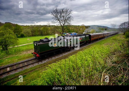 Irwell Vale, UK. 27th Apr, 2017. The City of Wells locomotive steams through the Lancashire countryside on its regular service along the East Lancashire Railway from Bury to Rawtenstall.  It is seen here approaching the Irwell Vale stop. Picture by Paul Heyes, Thursday April 27, 2017. Credit: Paul Heyes/Alamy Live News Stock Photo