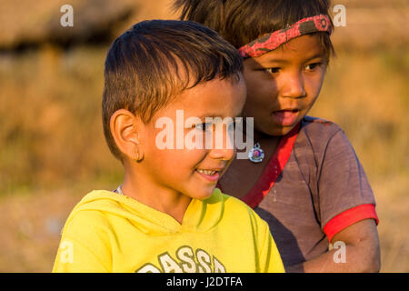 Portaits of two local boys in the village Pandavnagar in Chitwan National Park Stock Photo