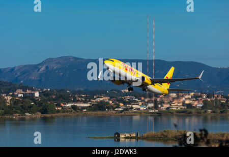 Corfu, Greece - August 18, 2015: TUIfly Boeing 737-800 taking off from Corfu International Airport. Stock Photo