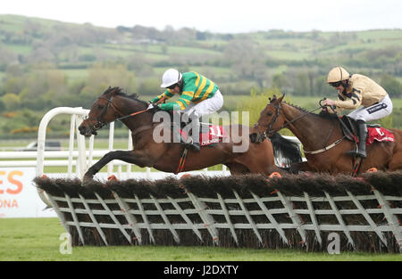 Unowhatimeanharry ridden by Noel Fehily (left) goes on to win The Ladbrokes Champion Stayers Hurdle ahead of Nichols Canyon ridden by Ruiby Walsh during day three of the Punchestown Festival in Naas, Co. Kildare. Stock Photo