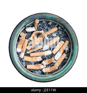 A circular ashtray full of old cigarette stubs. Stock Photo