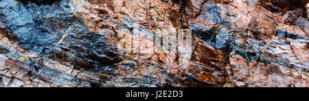 Wet natural stone rock wall, Canadian shield Algonquin Provincial Park Ontario Canada. Panorama View Stock Photo