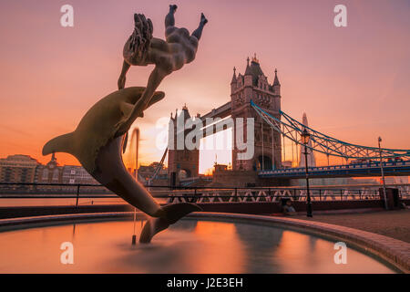 Photo of Girl with a Dolphin (1973), a sculpture by London's Tower Bridge by David Wynne. Stock Photo