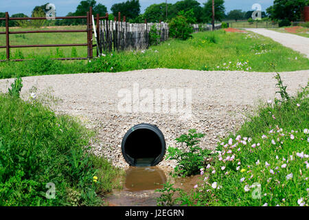 Drainage pipe: New culvert under small country side gravel road Stock ...