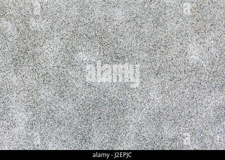 little grey pebbles surface with abstract stains. Seamless texture, backgrounds Stock Photo