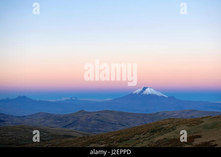 Landscape of the active 5897 meters high Cotopaxi volcano at sunset near the capital city of Quito, Ecuador. Stock Photo