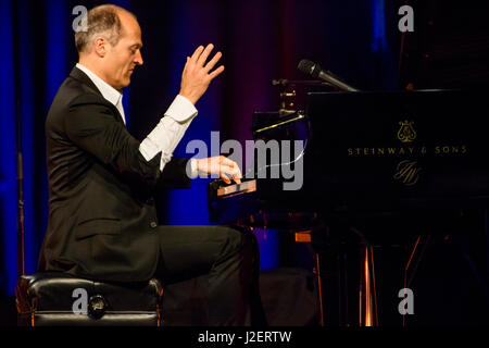 Wetzlar, Germany. 26th April, 2017. Joja Wendt, German jazz pianist and entertainer from Hamburg,  performs his concert program 'Die Kunst des Unmöglichen' (English: The Art of Impossible) at Stadthalle Wetzlar. --- Fotocredit: Christian Lademann Stock Photo