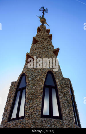 A precursor to Casa Mila, Palau Guell is also famous for its unusually shaped chimneys, designed by Antoni Gaudi in Barcelona, Spain. Stock Photo