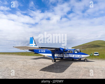 Foula part of the Shetland Islands, it is one of the most remote permanently inhabited islands in the UK. Airplane on the airfield. Scotland (Large format sizes available) Stock Photo