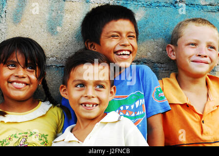 Belize, El Progreso, 4 friends at school Stock Photo