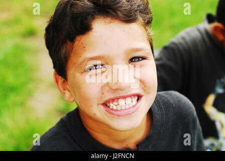 Belize, El Progreso, portrait of smiling boy at school Stock Photo