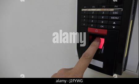 Finger print scan for enter security system Stock Photo