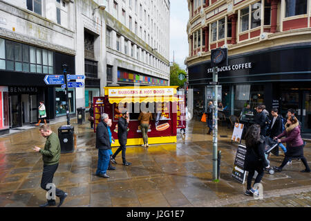 Burgar and hot dogs fast food cabin in Tib Street / Market Street, Manchester city centre close to Piccadilly Garderns. Stock Photo