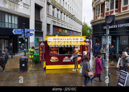 Burgar and hot dogs fast food cabin in Tib Street / Market Street, Manchester city centre close to Piccadilly Garderns. Stock Photo