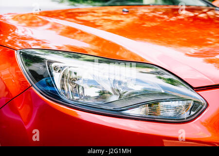 Red Car Front Headlight View Stock Photo