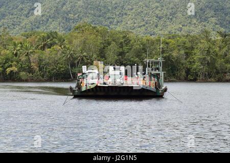 The Daintree River Ferry, a cable ferry, is the only way to access Cape Tribulation in northern Queensland, Australia Stock Photo