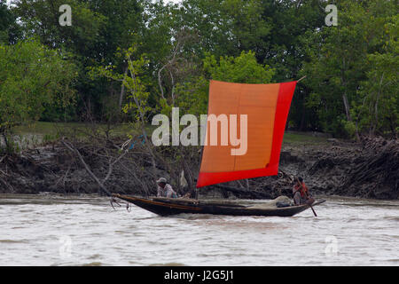 A sail boat on the Pasur River in Bagerhat, Bangladesh. Stock Photo