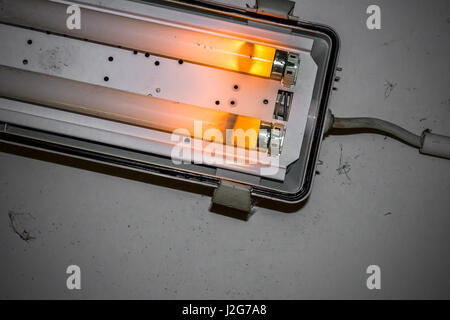Lamp with faulty neon tubes Stock Photo