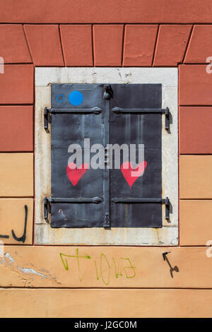 Hearts painted on window shutters, Ljubljana, Slovenia Stock Photo
