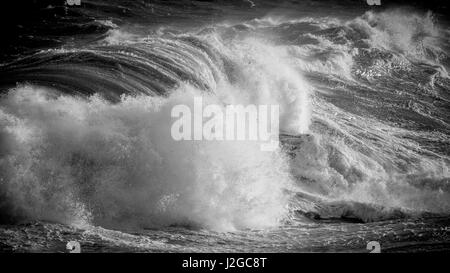 Black and white: Rough seas captured in Hondoq ir Rummien, Gozo during the stormy weekend of the 18th of December, 2016. Stock Photo