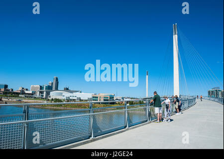 Bob Kerrey Pedestrian Bridge crossing the Missouri River from Nebraska to Iowa, Omaha, Nebraska, USA Stock Photo