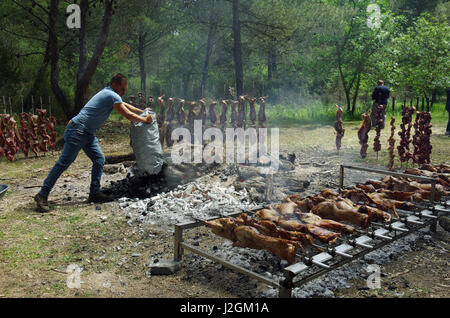 Bidonì, Sardinia. Easter Monday village festival: lam roasted Stock Photo