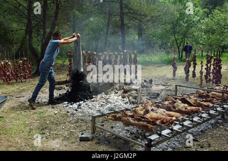 Bidonì, Sardinia. Easter Monday village festival: lamb roasted Stock Photo