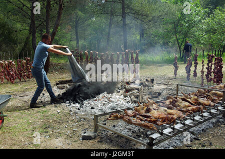 Bidonì, Sardinia. Easter Monday village festival: lamb roasted Stock Photo