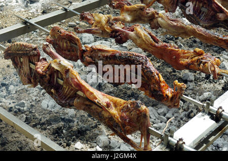 Bidonì, Sardinia. Easter Monday village festival: lamb roasted Stock Photo