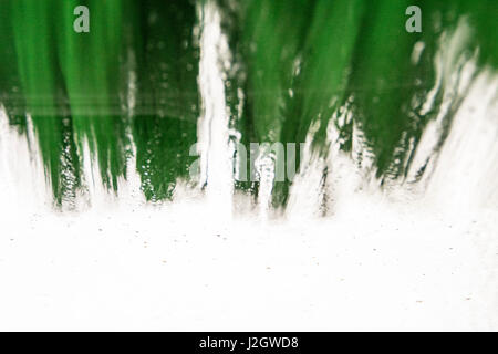A wet and soapy car windscreen at the car wash Stock Photo