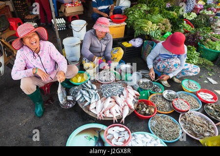 NHA TRANG, VIETNAM - JANUARY 20: Women are selling seafood at the wet market on January 20, 2016 in Nha Trang, Vietnam. Stock Photo
